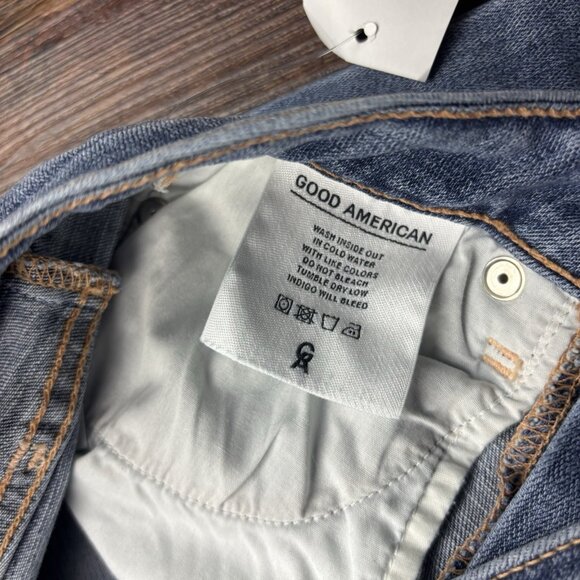 NWT Good American Good Waist Jeans Medium Wash Metal Holes Leg Trim Size 6/28 - Picture 7 of 12